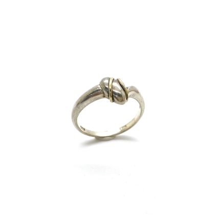 Zilveren fantasie ring in vorm van een hart.