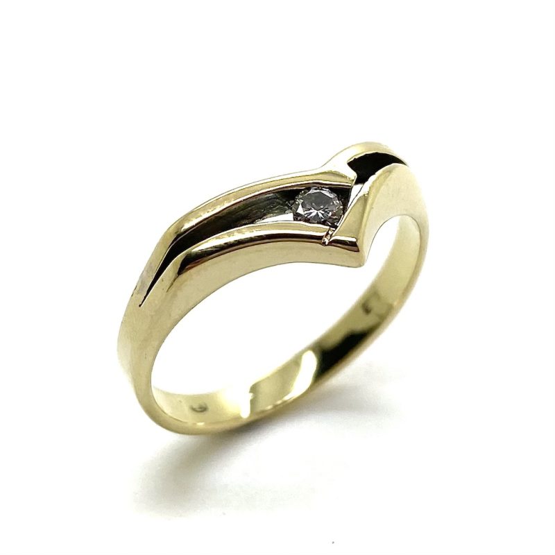 Gouden fantasie ring met diamant.