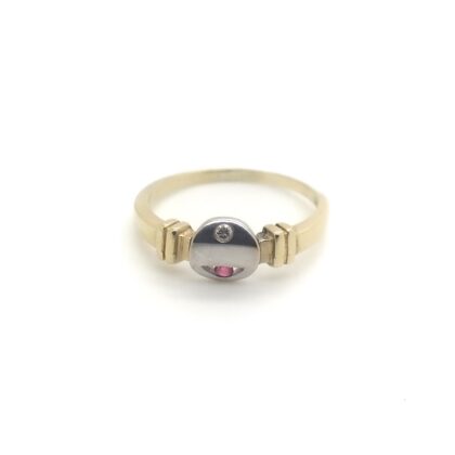 Vintage bicolor ring met ronde ringkop gezet met diamant en robijn.