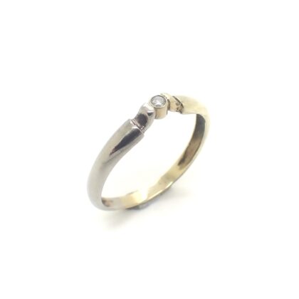 Gouden gladde bicolor ring gezet met diamant.